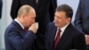 O'zbekiston Bosh vaziri Shavkat Mirziyoyev (o'ngda) Rossiya Prezidenti Vladimir Putin bilan