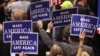 Delegates hold signs during speeches at the Republican National Convention, Cleveland, Ohio, July 18, 2016. 