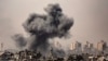 This image taken from the Israeli border with the Gaza Strip on Oct. 29, 2023, shows a black cloud of smoke ascending from the Gaza Strip amid the ongoing battles between Israel and the Palestinian group Hamas. 