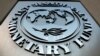 FILE - The International Monetary Fund logo is seen outside the headquarters building in Washington, Sept. 4, 2018.