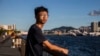 FILE - This picture taken on Aug. 8, 2020, shows Tony Chung posing in Hong Kong. 