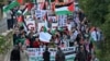 Protesters wave Palestinian flags as they take part in a demonstration to demand a cease-fire in Gaza in Montpellier, France, on Nov. 18, 2023.