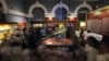 People view colonial-era artifacts that have been returned from the Netherlands, at the main Museum in Colombo, Sri Lanka, Dec. 5, 2023. 