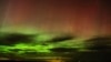 FILE - An aurora borealis, also known as the northern lights, is seen in the night sky April 24, 2023, near Washtucna, Wash. 