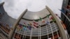 FILE - The Iranian and other flags flutter in front of the International Atomic Energy Agency (IAEA) organization's headquarters in Vienna, Austria, June 5, 2023. 