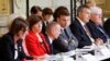 French President Emmanuel Macron, center, attends a meeting with officials from Western and Arab nations, the United Nations and nongovernmental organizations at the Elysee Palace, in Paris, Nov. 9, 2023. 