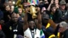 South Africa's Siya Kolisi holds the Webb Ellis trophy as fans welcome South Africa' Springbok team during their arrival at O.R Tambo's international airport in Johannesburg, South Africa, Oct. 31, 2023, after the Rugby World Cup.