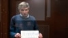 From VOA Russian: Former Moscow lawmaker Alexei Gorinov staged anti-war protest in courtroom cage
