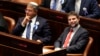 FILE - Israeli right-wing Knesset member Itamar Ben Gvir, left, and Bezalel Smotrich look on during the swearing-in ceremony for Israeli lawmakers at the Knesset, Israel's parliament, in Jerusalem, Nov. 15, 2022.