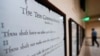 FILE - A copy of the Ten Commandments is posted along with other historical documents in a hallway of the Georgia Capitol, in Atlanta, June 20, 2024.