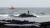 FILE - Rescuers look for bodies after a boat with 46 migrants from the Maghreb region capsized off Orzola, on Lanzarote island, June 18, 2021. Nearly 32,000 migrants have reached the Canary Islands from West Africa in 2023, authorities said Nov. 5, 2023.