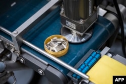 This picture shows the Swedish Match production line of portion snus, a smokeless tobacco product that is placed under the upper lip, in the company's factory in Gothenburg, Sweden, Oct. 17, 2023.
