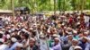 ২০১৭ সালে সামরিক দমন অভিযান থেকে বাঁচতে প্রতিবেশী দেশ মিয়ানমার থেকে পালিয়ে আসার পঞ্চম বার্ষিকী উপলক্ষ্যে রোহিঙ্গা শরণার্থীরা বাংলাদেশের কক্সবাজারের কুতুপালং শরণার্থী শিবিরে জড়ো হচ্ছে। ২৫ আগস্ট, ২০২২। ফাইল ছবি। 