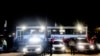 Vehicles from Johannesburg Metro Police Department (JMPD) and South Africa Police Service (SAPS) are seen in Diepsloot area, Johannesburg, during a joined operation against the high level of criminality in the area, Oct. 22, 2022.