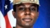 FILE - This portrait of American soldier Travis King is displayed at the home of his grandfather Carl Gates, July 19, 2023, in Kenosha, Wisconsin.