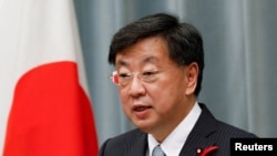 FILE - Chief of Cabinet Secretary Hirokazu Matsuno in Tokyo, Japan, October 4, 2021. 