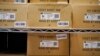 FILE - Boxes containing Yeezy shoes made by Adidas are seen at Laced Up, a sneaker resale store, in Paramus, N.J., Tuesday, Oct. 25, 2022.