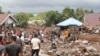 Rescuers and villagers search for missing people following a flash flood that killed a number of people in Rua, Ternate Island, Indonesia, Aug. 25, 2024. 