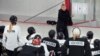 FILE - Courtney Kessel, head coach of the Boston-based team of the Professional Women's Hockey League, instructs her players during a team hockey practice on Nov. 20, 2023, in Wellesley, Massachusetts. The new six-team league began play on Jan. 1, 2024. 