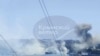FILE - This image from video shows smoke rising from a Ukrainian missile strike at Russia’s Black Sea fleet headquarters in Sevastopol, Crimea, Sept. 22, 2023. Russia said Dec. 15, 2023, that it had shot down 26 drones over the Crimean Peninsula. 