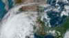 This satellite image provided by NOAA on Oct. 19, 2023, shows Hurricane Norma approaching the southern tip of the Baja California peninsula on Mexico's Pacific coast.