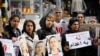 FILE - A demonstration supporting the Swedish-Iranian doctor and researcher Ahmadreza Djalali, who is imprisoned and sentenced to death in Iran, was held in Stockholm, May 14, 2022.