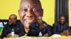 South African President Cyril Ramaphosa gestures next to members of the National Executive Committee (NEC), Deputy President Paul Mashatile and Gwede Mantashe, as they meet to look at options to form a new government, in Boksburg, June 6, 2024. 