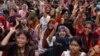 FILE - Students and job seekers shouts slogans as they protest, calling for a ban on quotas for government jobs, at Shahbagh Square in Dhaka, Bangladesh, July 3, 2024.