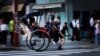 Rickshaw puller Akina Suzuki, 19, drives a rickshaw around Asakusa district in Tokyo, Japan, June 18, 2023.