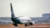 FILE - Alaska Airlines plane is getting ready to take off at Reagan National Airport in Washington, DC, Feb. 16, 2023. (Photo: Diaa Bekheet)