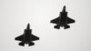 Two F-35 fighter jets return to air base Flyvestation Skrydstrup after patrolling around Denmark at low altitude, Oct. 1, 2023.