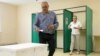 A voter casts a ballot during the second round of the country's presidential election at a polling station in Vilnius, Lithuania on May 26, 2024. 