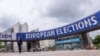 People walk outside the European Parliament in Brussels, May 23, 2024. Police searched the Belgian and French offices, as well as the residence, of a European Parliament employee on May 29, as part of a probe into a suspected Russian interference campaign.