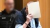 Nine accused of 'Reichsbuerger' coup plot go on trial in Germany 