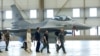 FILE - Ukrainian President Volodymyr Zelenskyy and Dutch Prime Minister Mark Rutte walk past an F-16 fighter jet in Eindhoven, Netherlands, Aug. 20, 2023.