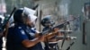 Police fire rubber bullets in an attempt to disperse Bangladesh Nationalist Party (BNP) activists as they attempt to block a highway in Araihazar, some 40km from Dhaka, Oct. 31, 2023. 