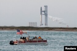 Spectators await the launch of SpaceX's Starship from the company's Boca Chica launchpad near Brownsville, Texas, April 17, 2023. The launch was delayed for at least 48 hours, due to a pressurization issue in a rocket booster