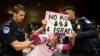 An anti-war protester is taken away by police during a Senate Appropriations Committee hearing on Capitol Hill in Washington, Oct. 31, 2023.