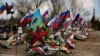 Могилы российских военнослужащих, погибших на Украине, на кладбище в Волгоградской области России 30 марта 2024 года.