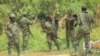 Wanajeshi wa vikosi vya jeshi la ulinzi Uganda (UPDF) wakifanya doria dhidi ya waasi wa ADF katika eneo la Mukakati. Picha na AFP