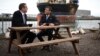 British Prime Minister Rishi Sunak speaks to Scottish Conservatives leader Douglas Ross, left, at the Port of Nigg, ahead of a campaign event in the buildup to the UK general election on July 4, in northeast Scotland, May 23, 2024.