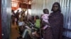 FILE - A handout photograph, taken in January 2024, shows a woman and baby at the ZamZam displacement camp in North Darfur, Sudan. (MSF/Mohamed Zakaria/Handout via Reuters)
