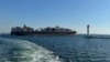 FILE - A container ship leaves the port of Odesa, Ukraine, on Aug. 16, 2023, to proceed through a temporary corridor established for merchant vessels.