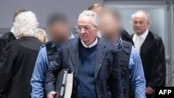 Prince Heinrich XIII Reuss arrives in the courtroom for the trial against him, a former MP and ex-army officers accused of masterminding a conspiracy theory-driven plot to attack the German parliament, May 21, 2024 in Frankfurt am Main, Germany. 