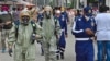 National Disaster Response Force (NDRF) personnel arrive to inspect the gas leak accident at a factory in Ludhiana, Apr. 30, 2023. 