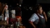 FILE - A saleswoman waits for customers at her stand during a power cut, in Quito, Ecuador, April 18, 2024. The entire country lost power on June 19, 2024, for periods of time due to production problems.