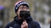 FILE - Simon Cheng, founder of Hongkongers in Britain, attends an event in Leicester Square, central London, on Dec. 12, 2020. 