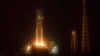 FILE — The Artemis I unmanned lunar rocket lifts off from launch pad 39B at NASA's Kennedy Space Center in Cape Canaveral, Florida, Nov. 16, 2022. The U.S. is delaying returning astronauts to the surface of the moon from 2025 to 2026, NASA said Tuesday. 