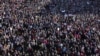 People across Iceland gather during the women's strike in Reykjavik, Oct. 24, 2023. 