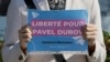 A protester holds a placard to bring attention to the arrest of Pavel Durov, founder and CEO of the Telegram messaging app, near the French Embassy in Moscow, Russia, Aug 25, 2024. The placard reads: "Freedom for Pavel Durov."